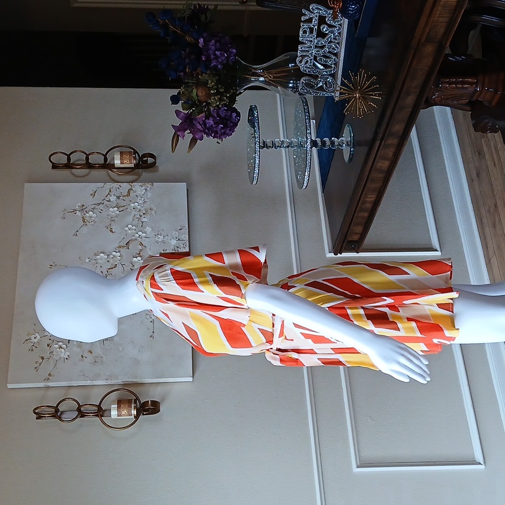 New Vibrant Orange and Yellow Patterned Wrap Mini Rorper. Size L - Picture 15 of 17